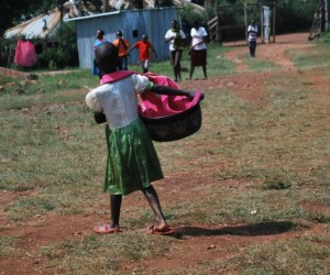 Child with Laundry Basket_100293614_